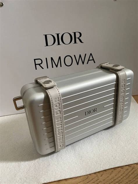 black dior and rimowa personal clutch|Rimowa Dior carry on.